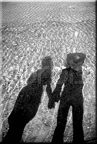 Shadow of Couple Holding Hands