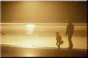 Silhouette of Father and Child Fishing
